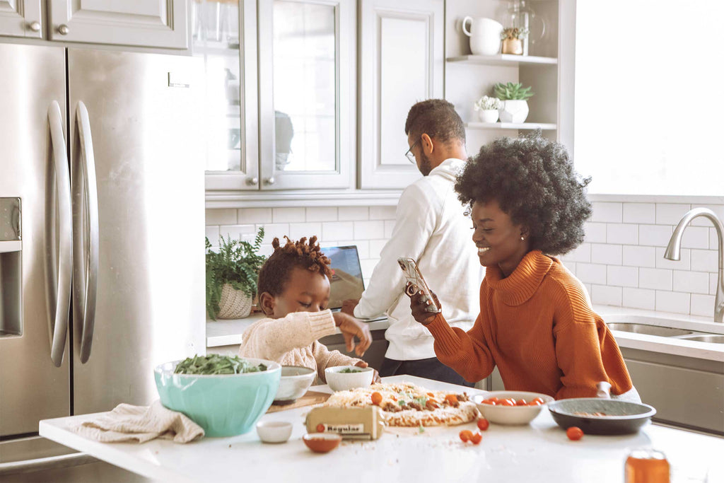 Family preparing a meal in a modern kitchen
