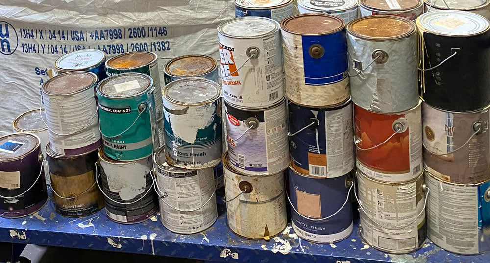 Close up of used paint cans